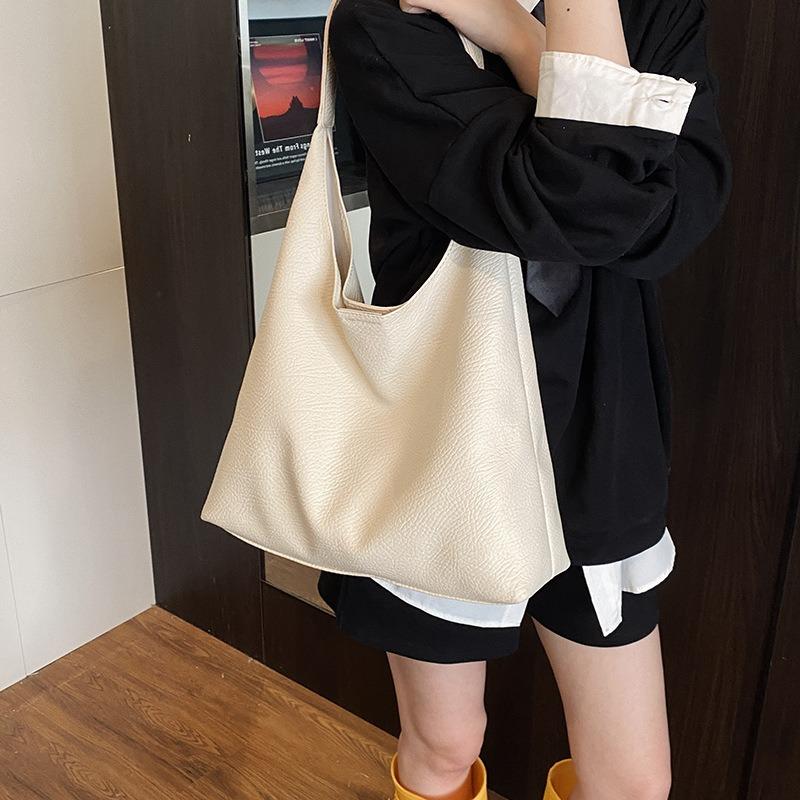 New light luxury niche bag, high-end sense versatile shoulder bag, women's commuting large-capacity tote bag
