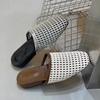 Sheepskin version~ Korean version woven hollow bag head half slippers women's 2025 new summer thick bottom flat bottom sandals outside wear