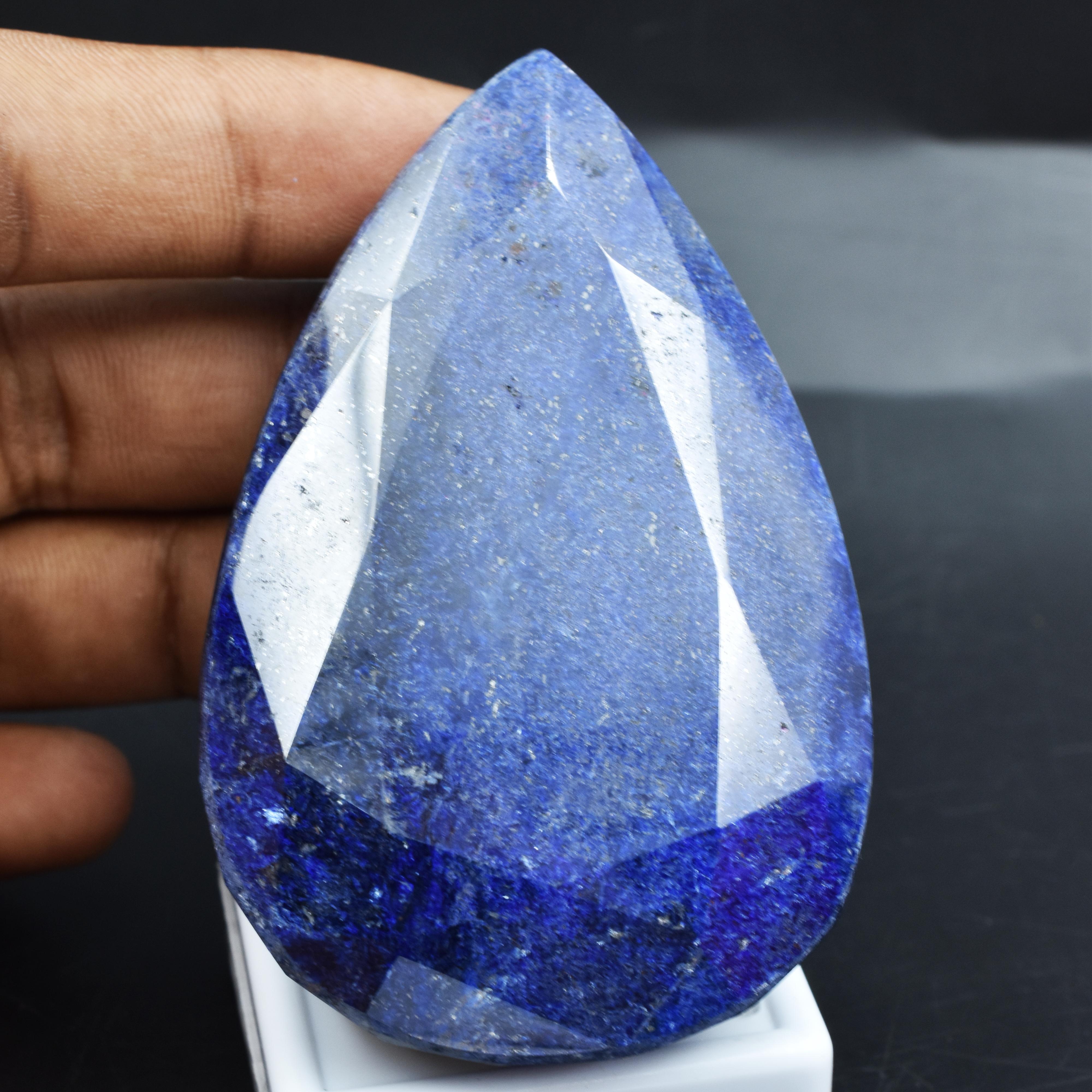 

Сапфір блакитний, огранка «крапля», 929,90 карата, натуральний, чоловічийs Каблучки Розсипний Дорогоцінний Камінь СЕРТИФІКОВАНИЙ AR-2572-S 77.4 mm approx синій