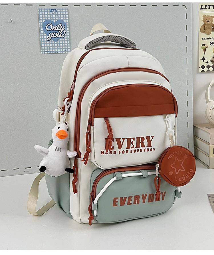 Schoolbag Korean version contrasting color splicing backpack 1011 new fashion and light travel backpack casual tooling style school bag