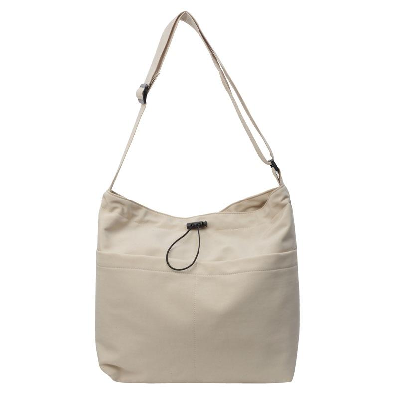 Женская однотонная сумка на плечо большой емкости — фото 11