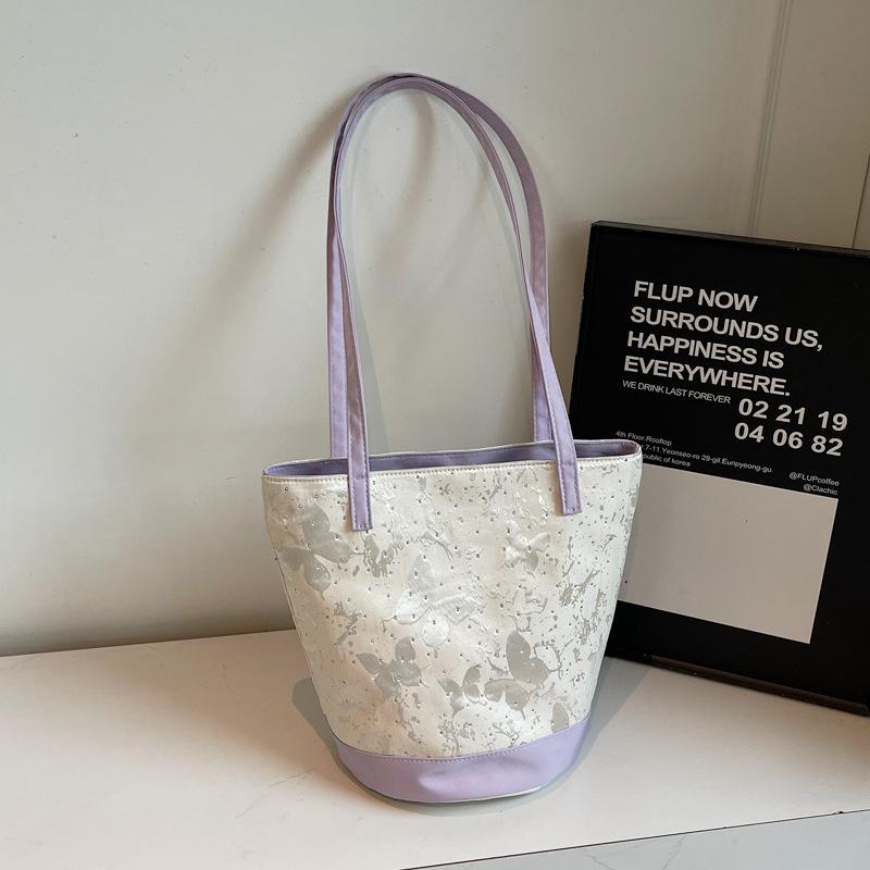 Summer contrast niche butterfly bucket bag 2025 summer new fashion simple foreign style underarm shoulder bag