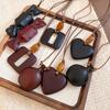 Artistic Retro Resin Heart Necklace: Simple, Fashionable, Versatile Sweater Chain with a High-Class Feel.