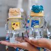 Water bottle new straw cup student children cartoon bear cup portable strap handle sticker plastic cup waterproof and drop resistant