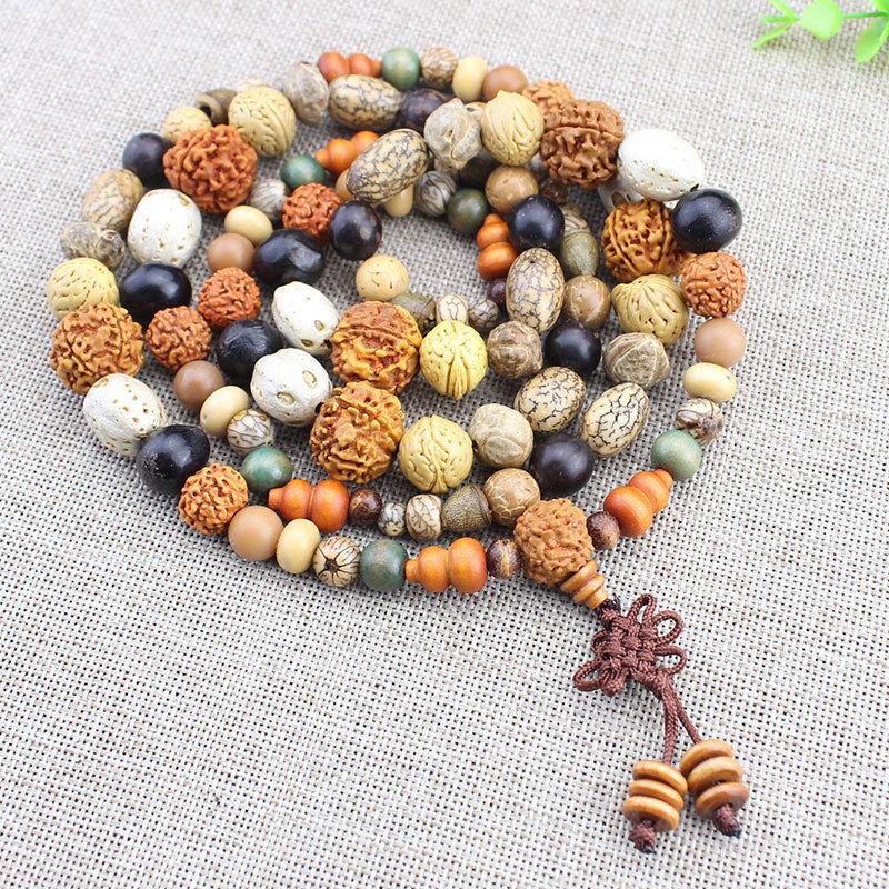 Creative Bodhi Seed Bracelet: 108 Beads for Meditation, featuring Eighteen Treasures, Star Moon, Vajra, and White Jade Bodhi.
