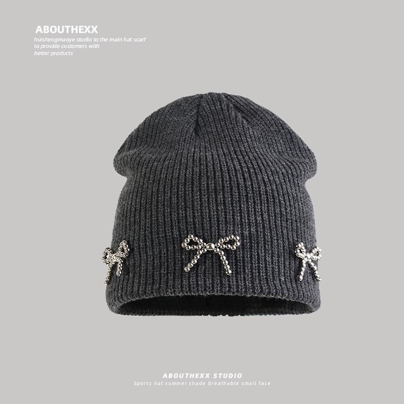 Korean Niche Hat Women's Bow Knitted Woolen Hat Autumn and Winter High End Cold Hat Warm and Versatile Ear Protection Hat Trend