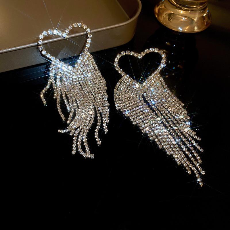 Silver Needle Water Drop Tassel Earrings - Light Luxury High-End Design for Women's Fashion.
