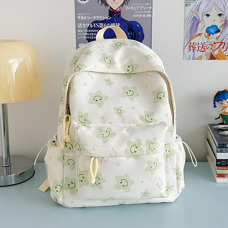 Nowy tornister jest wysokiej jakości, świeży, słodki i uroczy, a plecak w gwiazdki to lekki plecak podróżny dla uczniów gimnazjum.