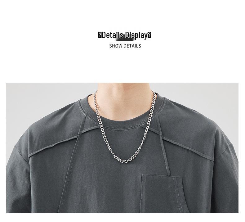 An Yang Pánské černé sešívané letní tričko s krátkým rukávem: Niche Jednobarevný design