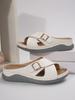 Summer new slope heel thick-soled slippers cross-strap buckle fish mouth cool slippers foreign trade large size hollow beach slippers