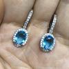 Exquisite White Gold-Plated Copper Earrings with Sea Blue Oval Cubic Zirconia Studs for Women