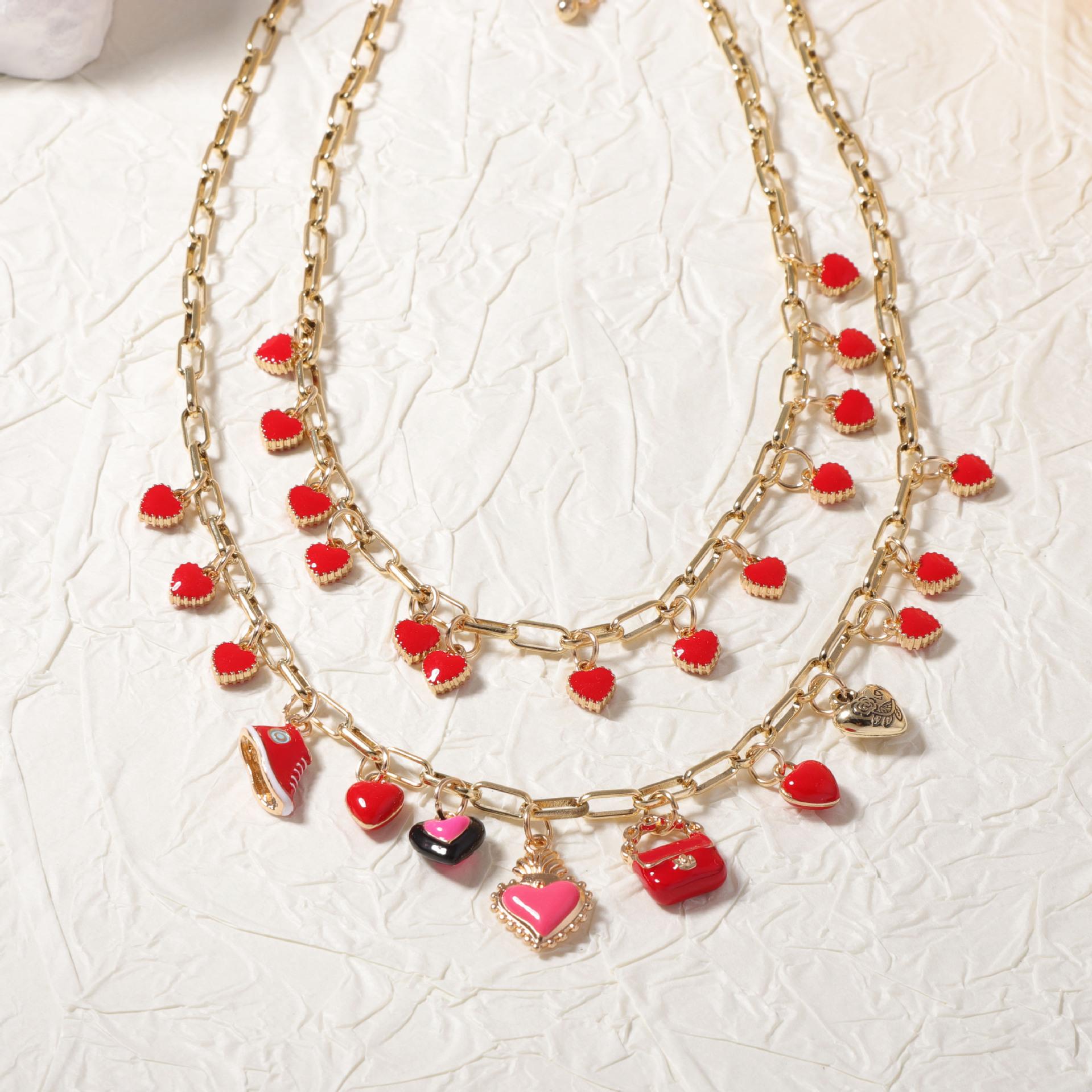 

Simple, fashionable, fresh, niche creative design sense, dripping alloy love bag, multi-layered wearing women s necklace червоний