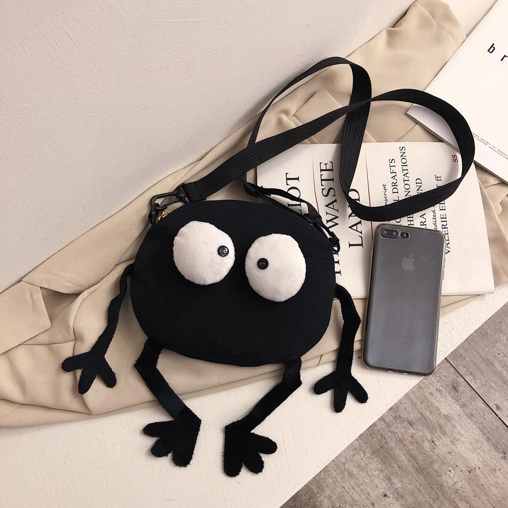 New Cartoon Big-eyed Monster Women's Bag Small Messenger Bag Unisex Black Canvas Shoulder Bag Telescopic shoulder strap Handbags