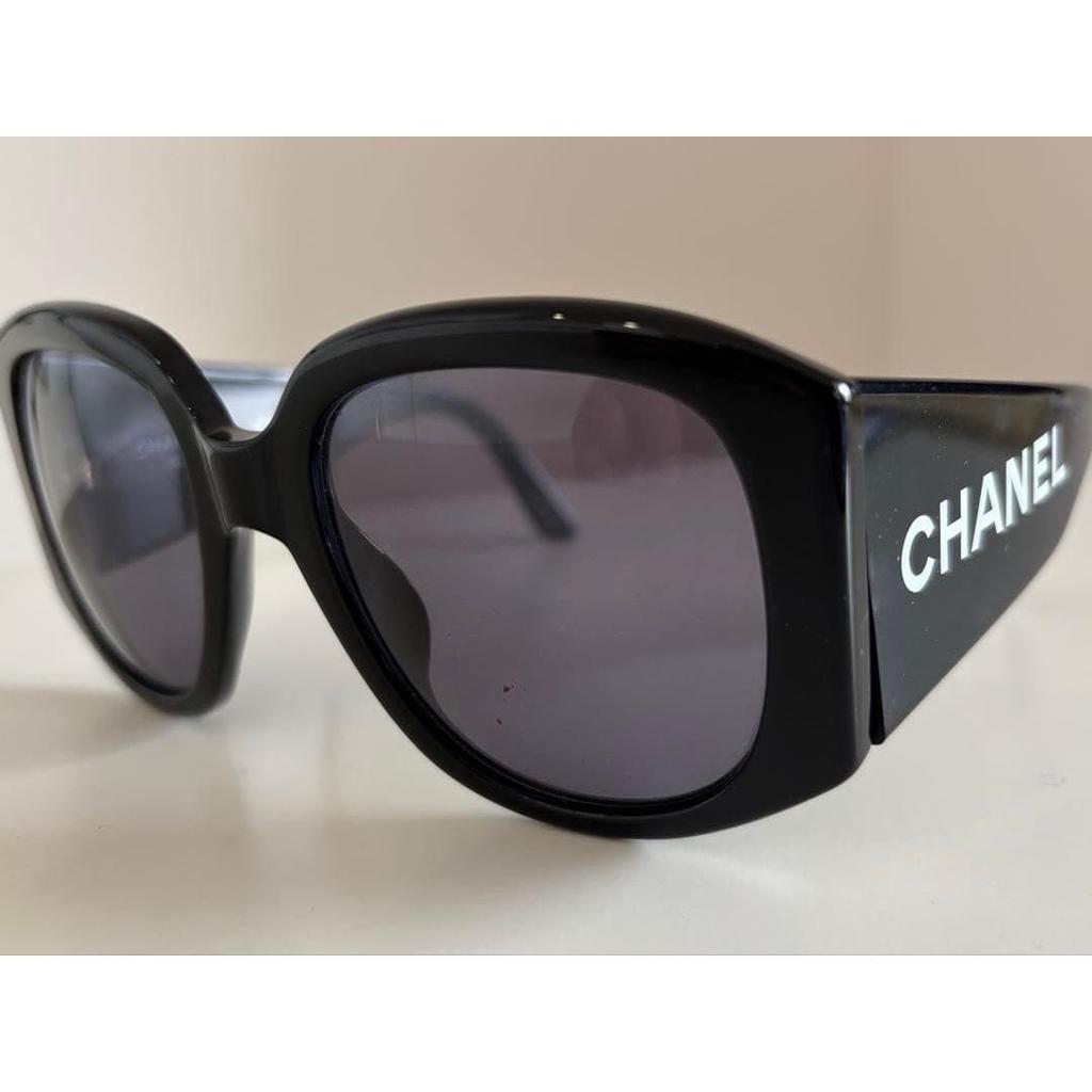 Used CHANEL sunglasses black with logo
