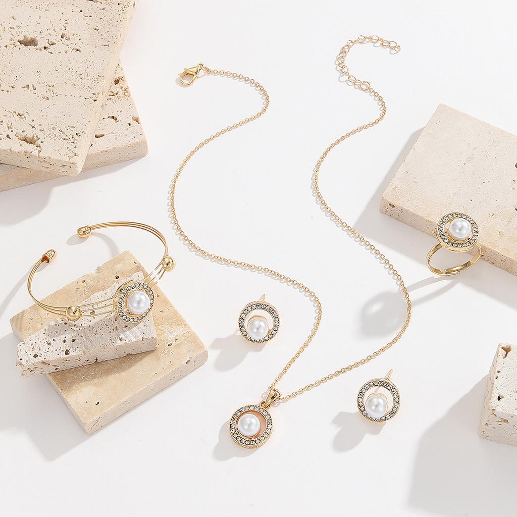 European and American fashion new creative design diamond-studded round pearl earrings, ring, necklace set accessories for women