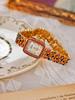 1 New Gold French Ladies Quartz Watch Strap Inlaid with Colored Rhinestone Mother-of-pearl Dial Design Niche Ladies Watch.