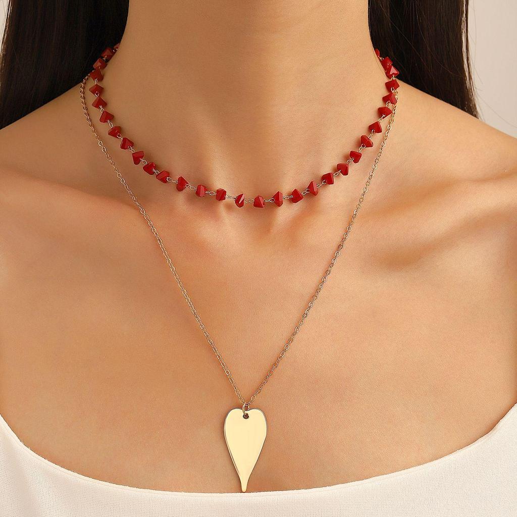 Exaggerated Heart Pearl Necklace with Irregular Hollow Design for Women