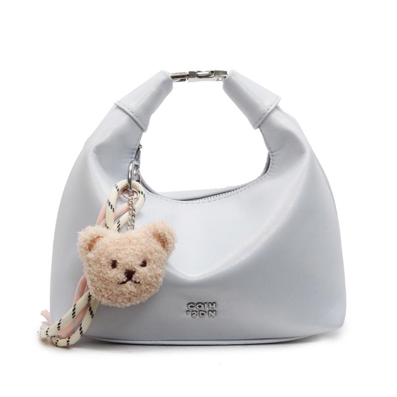 Korean version of fashionable simple high-quality textured wrist dumpling bag niche casual versatile commuter messenger crescent bag women