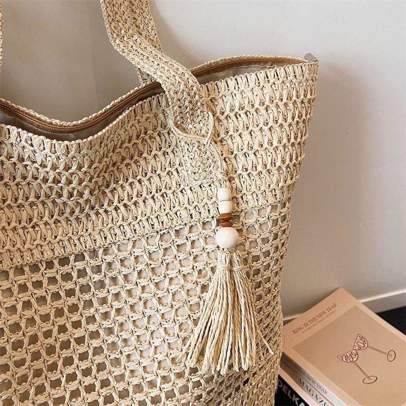 Woven Straw Tote with Tassel Accent and Spacious Interior for Summer Beach or Casual Daily Use