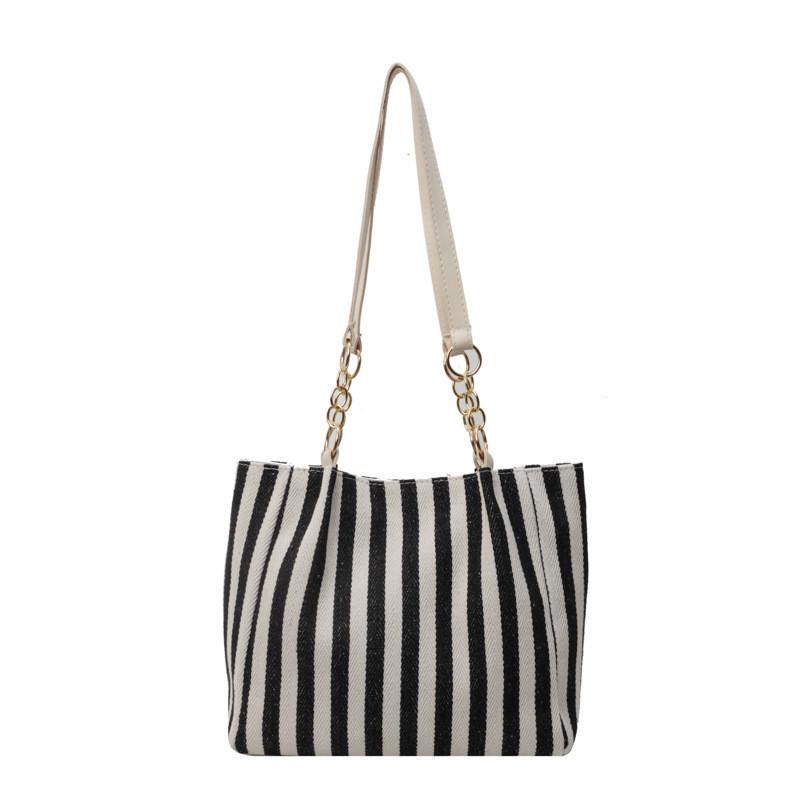 

Fashionable 2024 Spring New Vertical Striped Shoulder Bag Women s Tote Bag Simple Korean Version Underarm Bag чорний