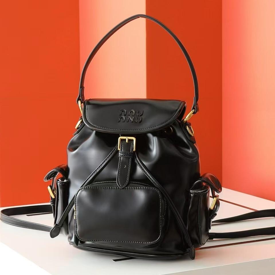 Nový Miao miu 2025 plátěný batoh velkokapacitní prémiový pocit všestranný přenosný ramenní cestovní dojížděcí batoh