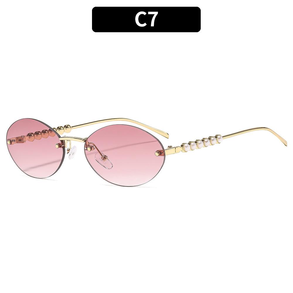 Ladies sunglasses, rimless oval sunglasses, pearl embellished sunglasses.