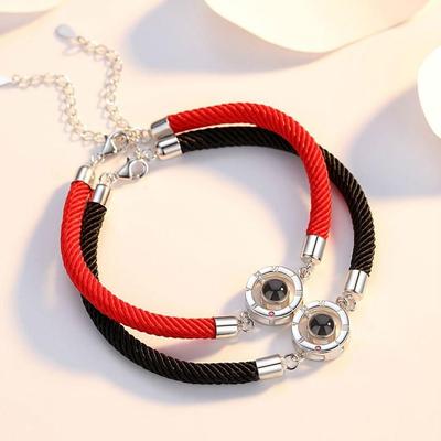 Unisex Round Projection Bracelet - Red & Black Rope Woven Design, Trendy and Versatile.