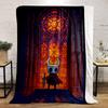 A vibrant stained glass window pattern with warm hues dominates the scene. for all seasons blanket lunch break throw gift