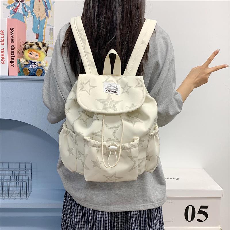 Schoolbag Korean sweet and cool drawstring backpack 1011 new five-pointed star printed schoolbag large capacity versatile cute small backpack