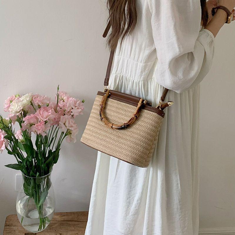 A Niche Crossbody Bag with A Feminine Texture A Hand-held Straw-woven Bucket Bag