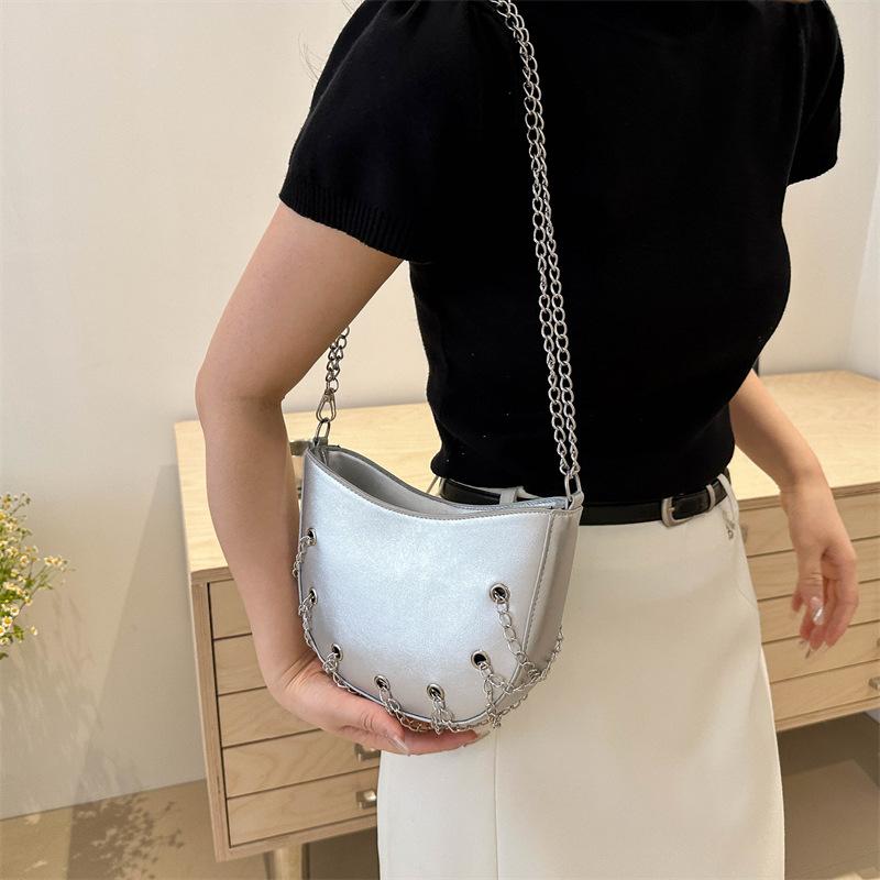 New Temperament Metal Chain Bag  Air-eye One-shoulder Crossbody Bag, Fashionable   Cool and Personalized French Saddle Bag