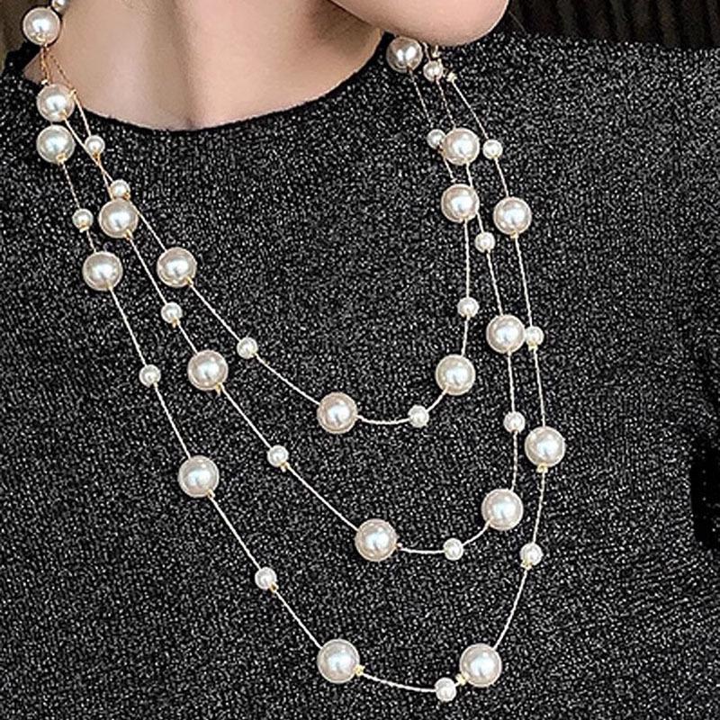 Korean Fashion Pearl Necklace: Elegant Long Chain for Women, Ideal for Sweaters, Versatile for Autumn and Winter.