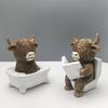 Highland Cow Bathroom Figurine Funny Scottish Cattle Sitting on Toilet Statue Resin Calf Bathing Sculpture for Home Tiered Tray Table Fireplace Decor