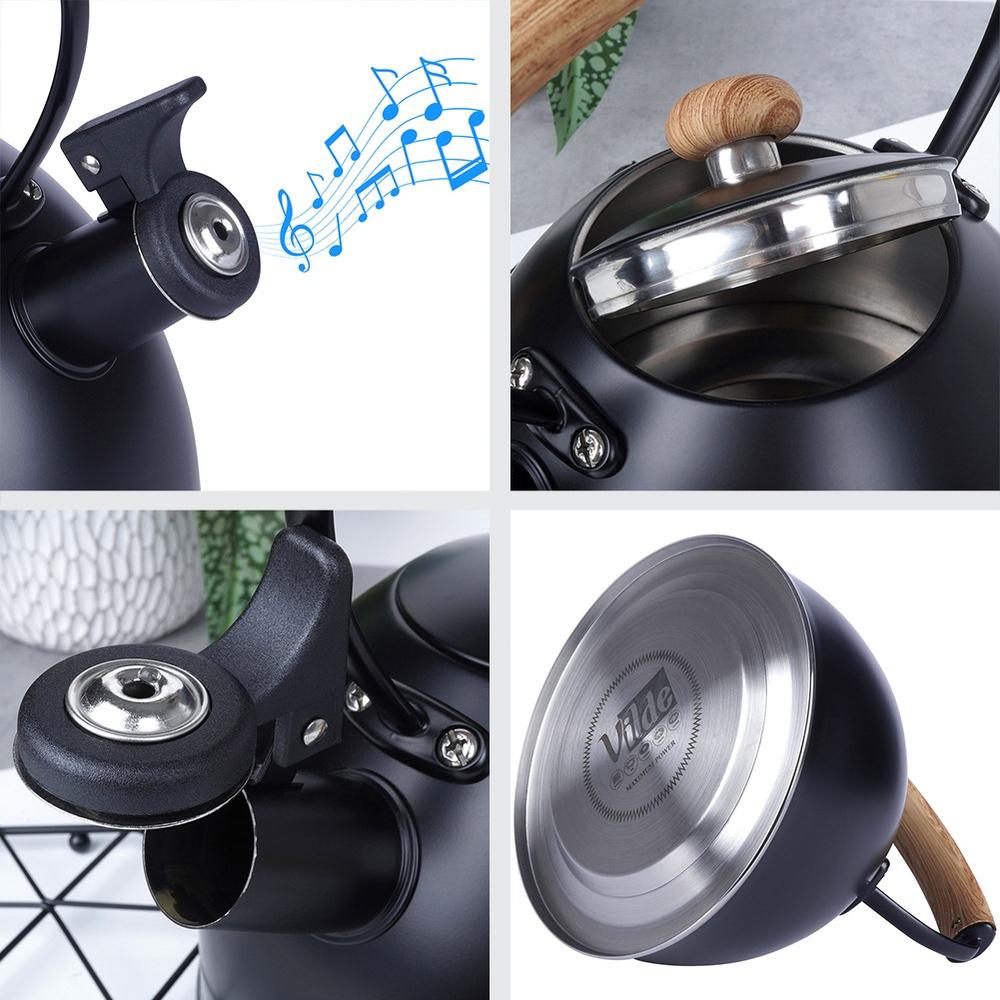 Black Steel Kettle with Whistle for Boiling Water on the Stove