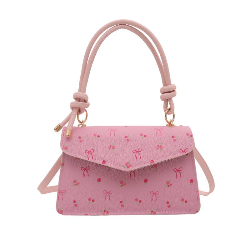 

Fresh and sweet portable small square bag women s bag autumn new cherry contrasting shoulder bag commuter bag рожевий