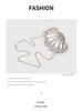 Elegant Irregular Shell Acrylic One-Shoulder Crossbody Clutch for Weddings and Banquets.