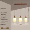 Modern Solid Wood Pendant Lamp with Three Heads, Walnut Finish, Japanese Style for Dining Rooms and Bars.