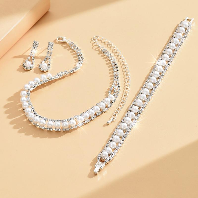 Bridal jewelry set: necklace, earrings, bracelet - elegant pearl collection