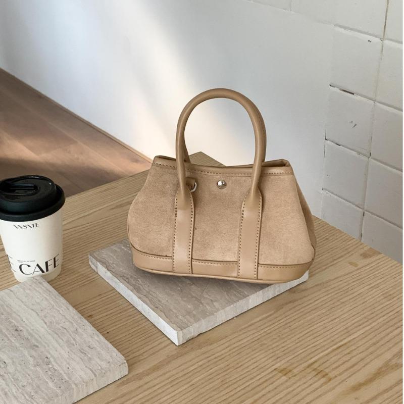 Suede hand carry garden bag retro shoulder messenger bag autumn and winter new portable small tote bag