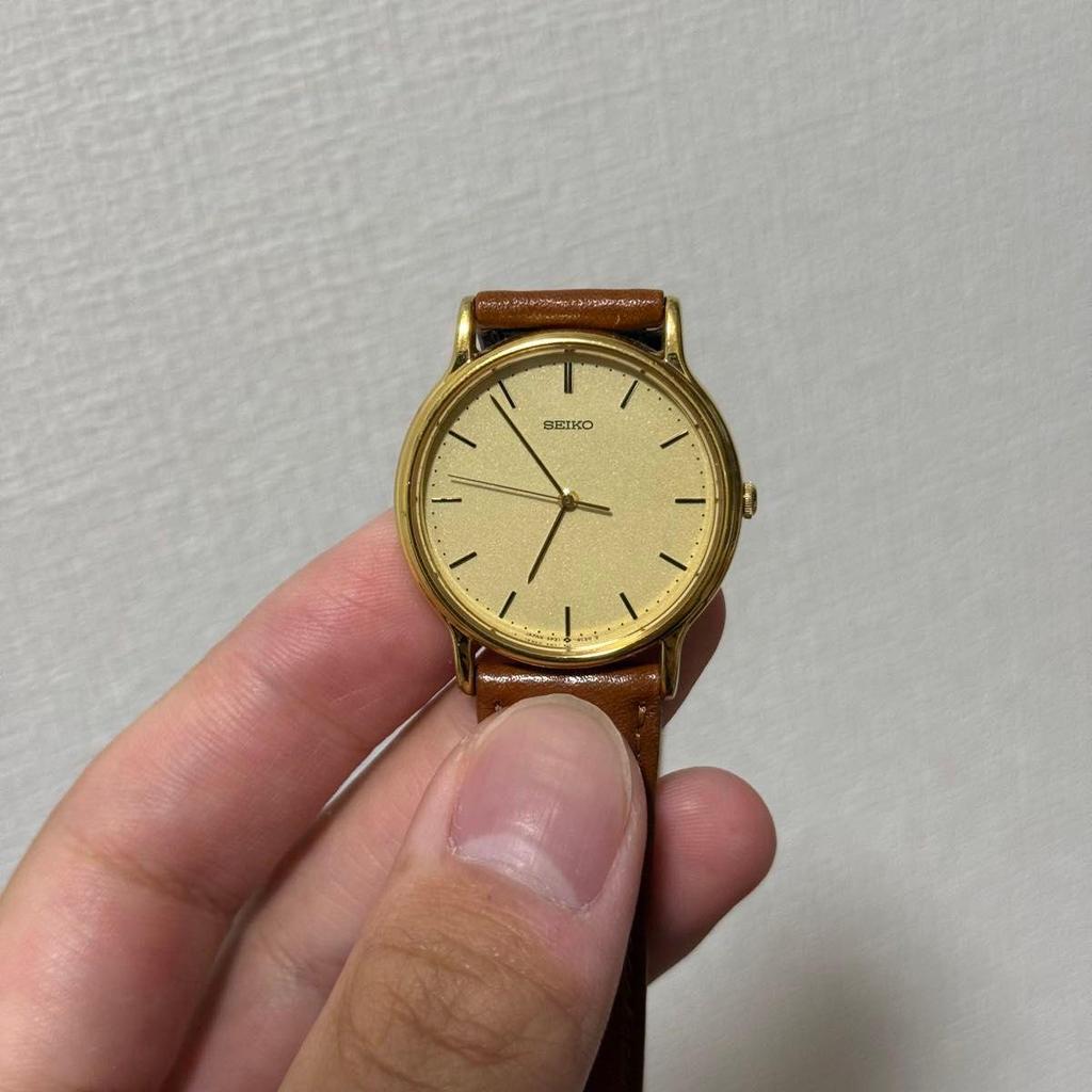 Used Working 88s vintage Seiko slim round men's quartz watch