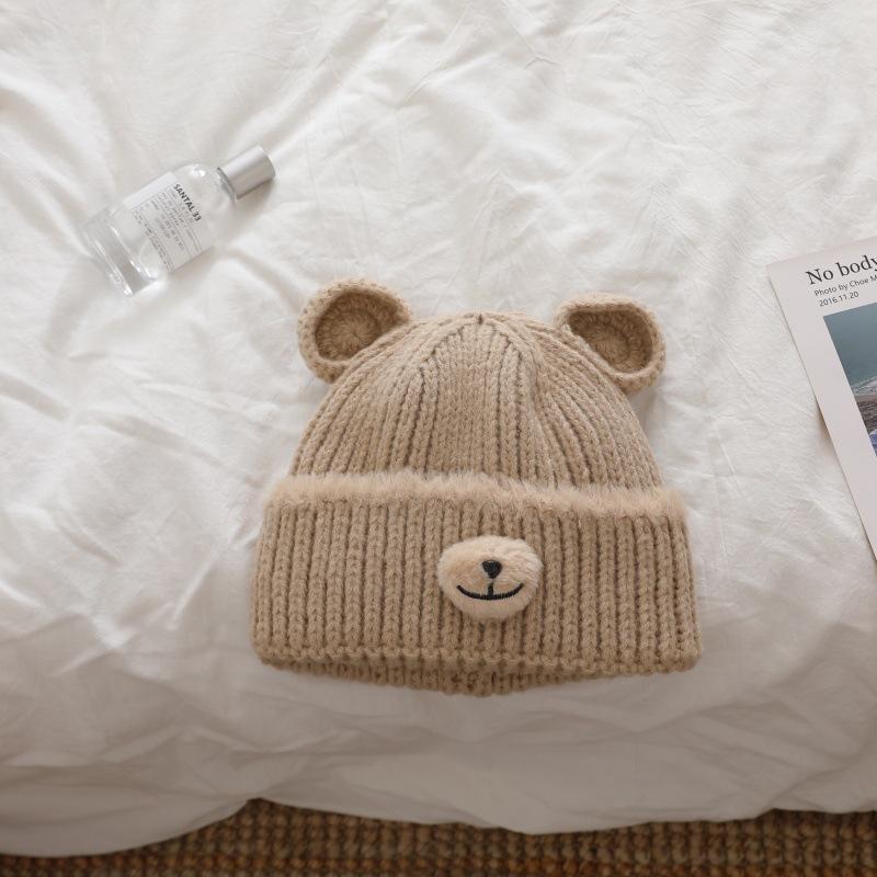 Thick knitted handcrafted bear wool Moao children's cute warm casual and face showing small pullover hat  cold hat for autumn and winter