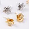 Exaggerated Light Luxury High-end Design Sense Metal Pleated Flower Earrings Retro Cold Wind Women's Earrings