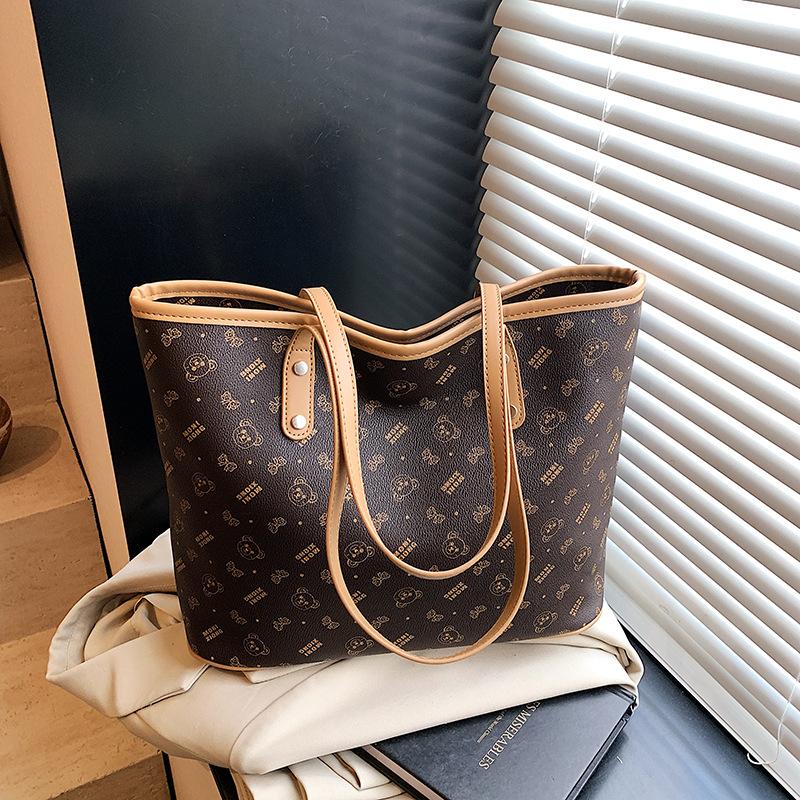 Korean casual fashion large-capacity bag women's 2025 summer new simple and fashionable high-value portable tote bag