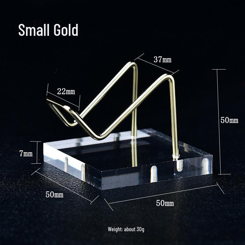 

Необработанный кристалл нефрита с акриловой основой на железной художественной стойке