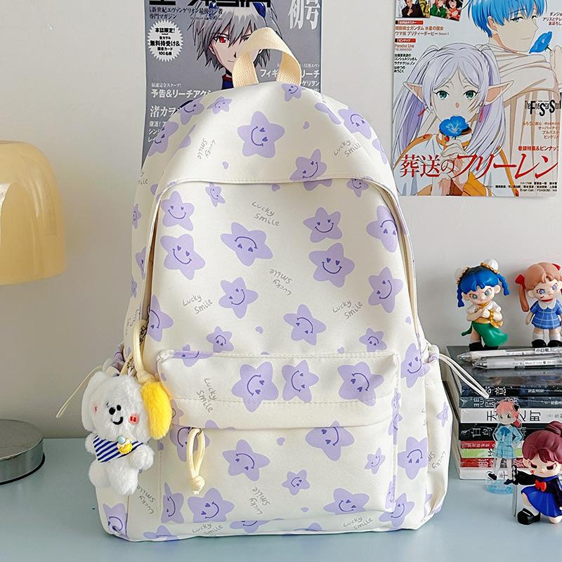 Nowy tornister jest wysokiej jakości, świeży, słodki i uroczy, a plecak w gwiazdki to lekki plecak podróżny dla uczniów gimnazjum.