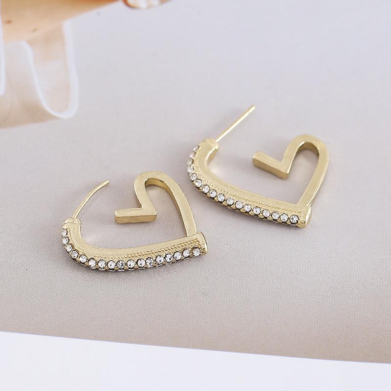 Trendy Love-Shaped Cubic Zirconia Stud Earrings – Stylish & Unique Design with High-End Appeal