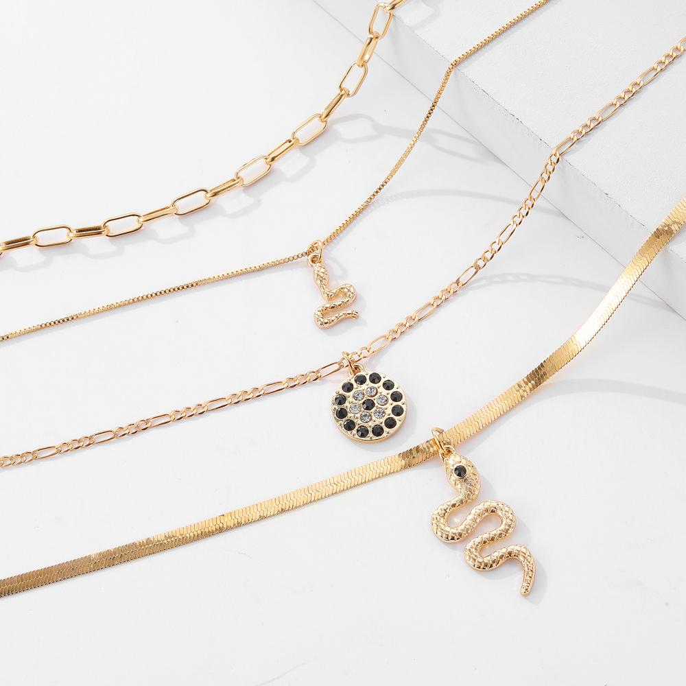 Four Piece Snake Necklace Women's Fashion Hollow Out Necklace Personality Bohemian Sweater Chain Elegant Snake Pendant