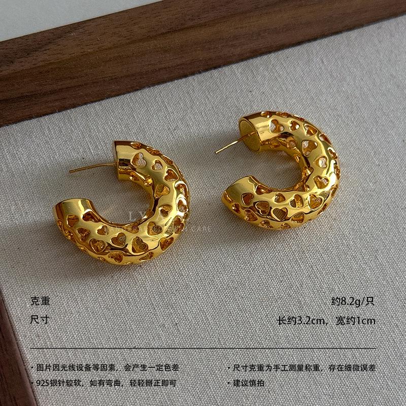 Medieval vintage earrings retro hammer pattern hollow relief gold and silver geometric niche light luxury earrings