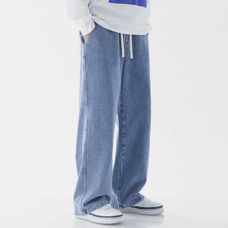 Męskie Jeansy Plus Size Jasnoniebieskie z Elastycznym Pasem - Luźne, Szerokie Nogawki, Sznurek, Długie do Ziemi, Codzienne i Wszechstronne.