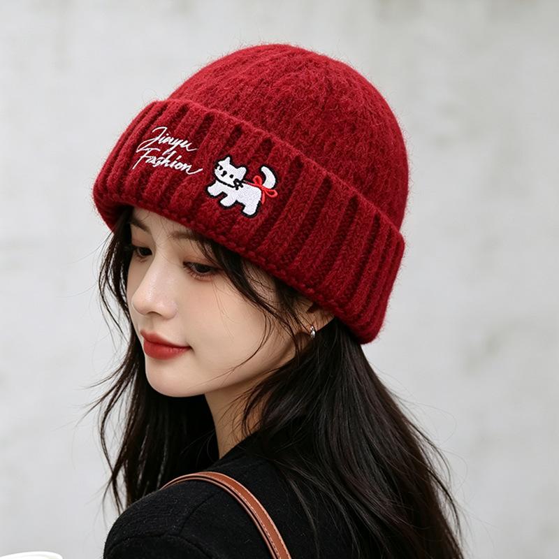 Source new cat letter embroidery knitted wool hat women's autumn and winter flanged warm cold hat stack hat